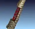 Fichtenzapfen. Abgebildet mit „CT Alpha“ von Procon X-Ray. Samen in rot.