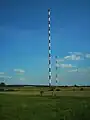 Sendeanlage für 756 kHz, bestehend aus einem 188 Meter hohen Rohrmast (im Vordergrund) und einem 99 Meter hohen Stahlfachwerkmast als Reflektormast (im Hintergrund)