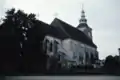 Evangelische Kirche (1966); bis 1895 eine Kirchenburg