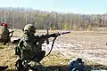 Japanischer Soldat mit einem Howa Typ 89 im Schulteranschlag
