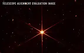 Erste Aufnahme des Sternes 2MASS J17554042+6551277 vom 13. März 2022 mit diversen Galaxien im Hintergrund