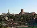 Die Gegengerade, im Hintergrund der Dom von Siena (links) und die Basilica di San Domenico (rechts)