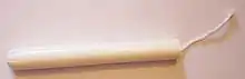 Tampon in einem Vaginalapplikator.